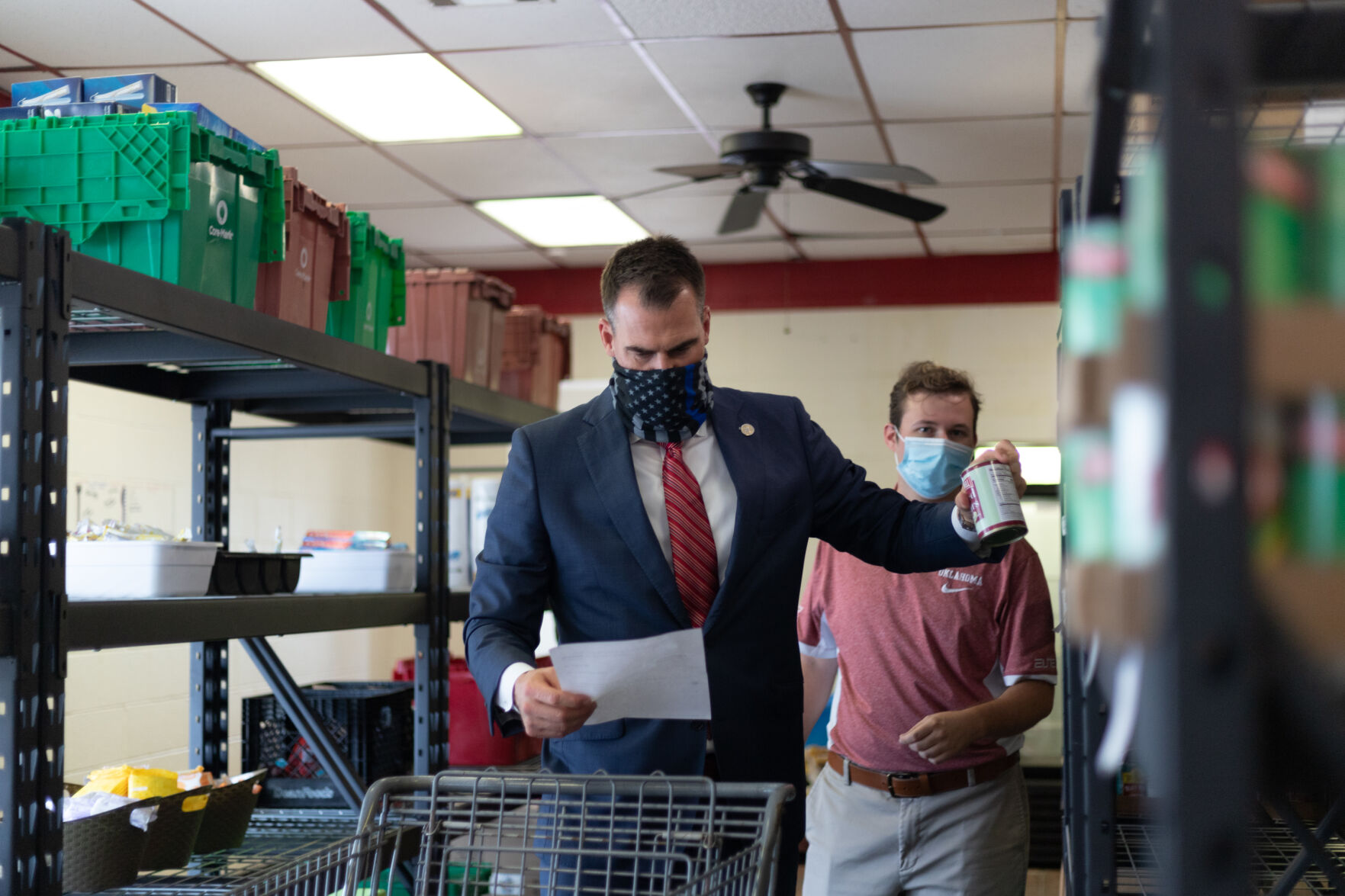OU Food Pantry Worker and Oklahoma Governor Kevin Stitt